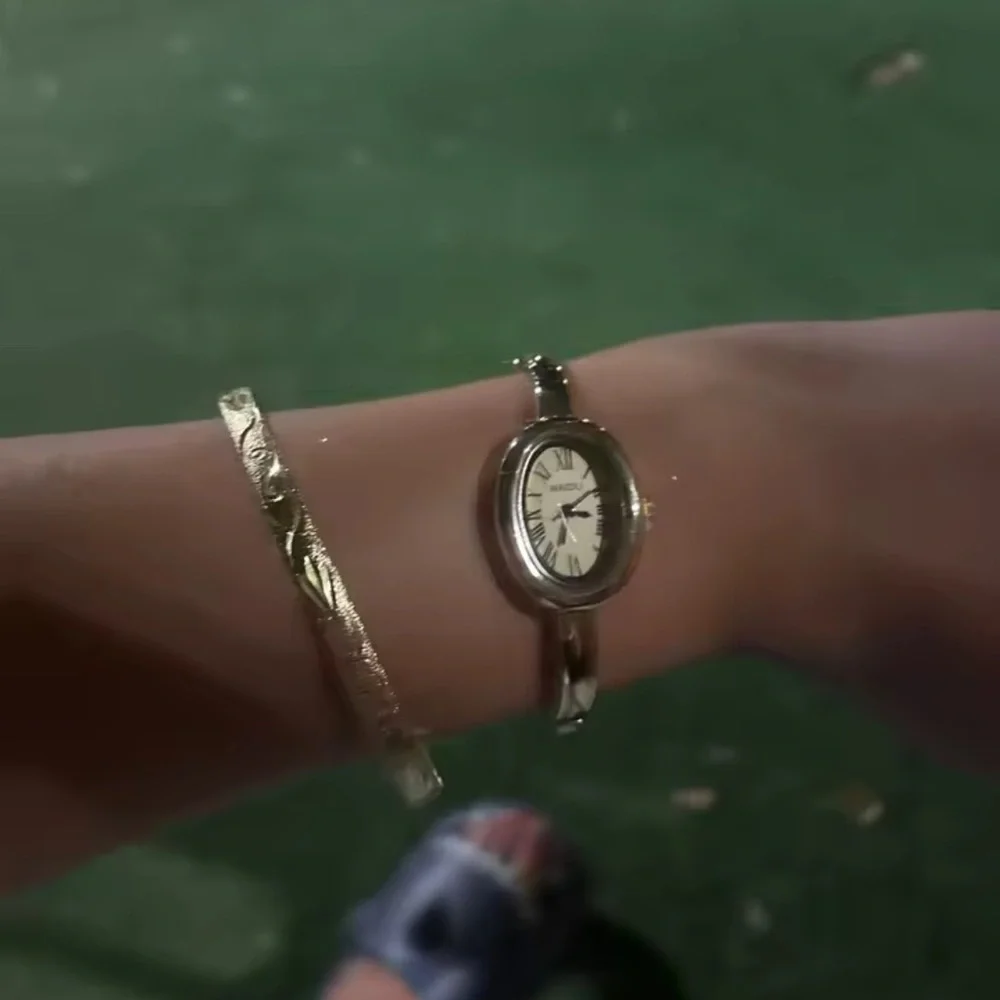 Anthropologie chic gold